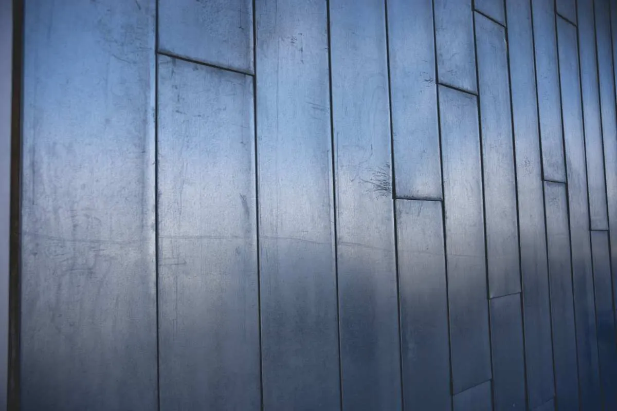 A painted metal railing on a home exterior