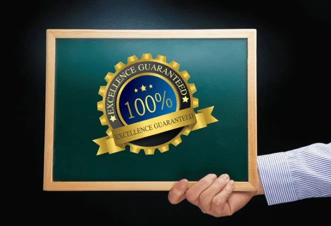 A man holding a sign reading 100 percent satisfaction guaranteed