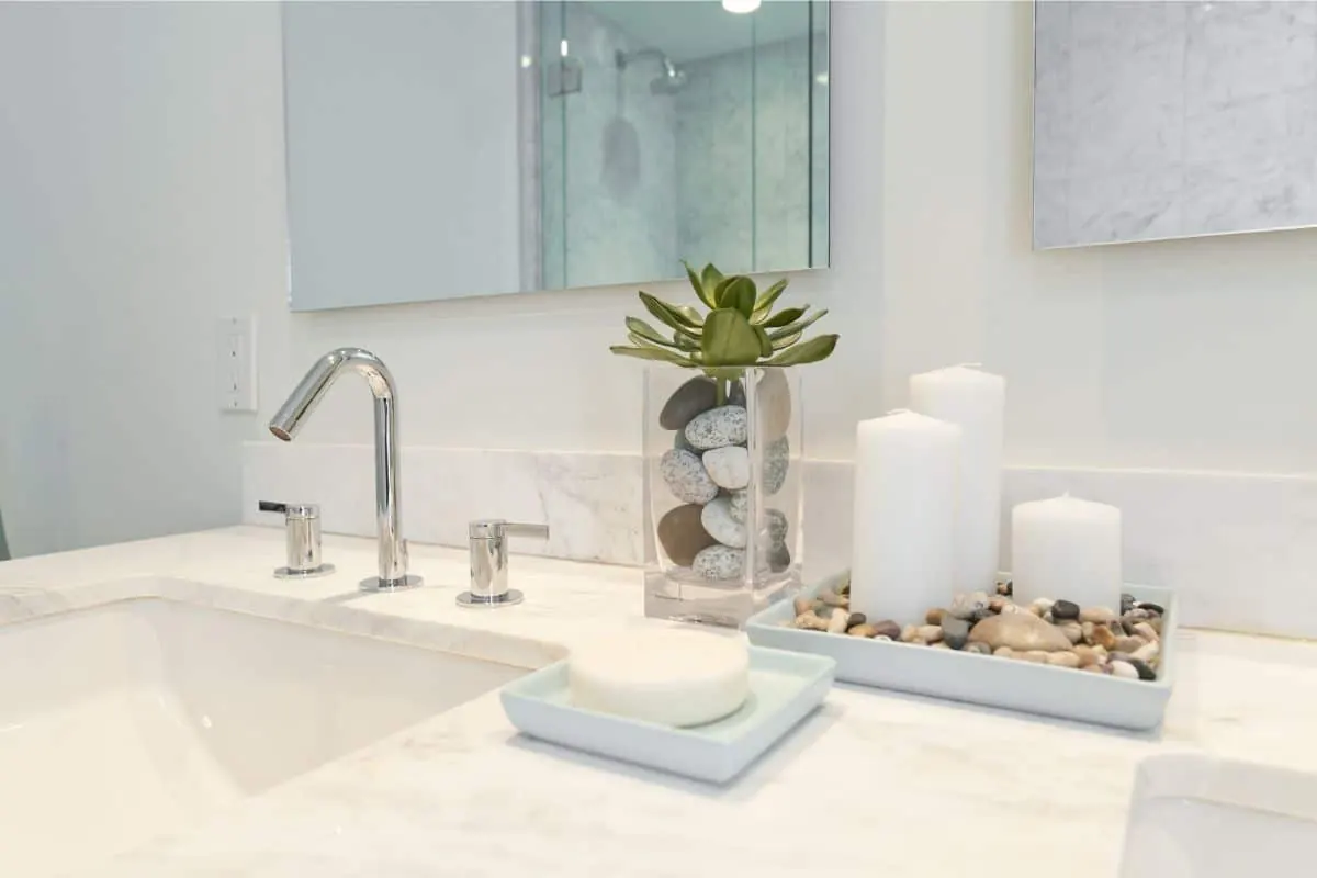 A bathroom painted in a soft neutral for staging