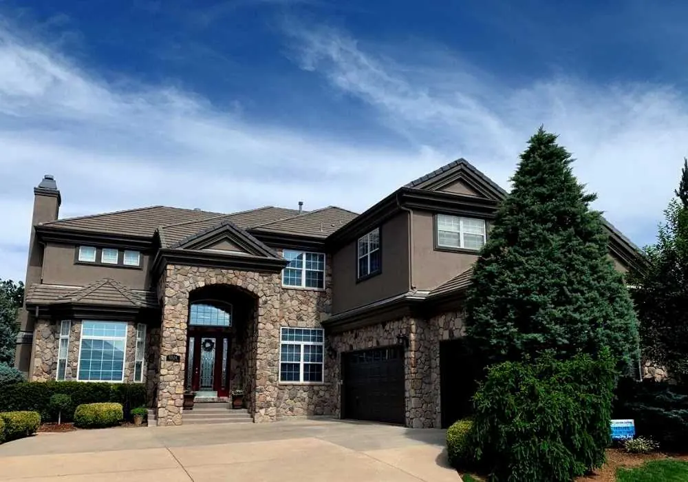 A painted stucco home exterior showing its surface texture