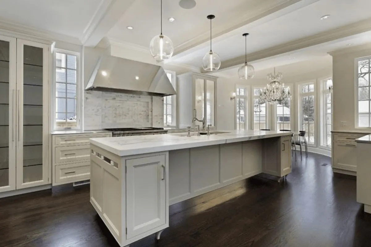 Bright white repainted kitchen with island, Denver metro